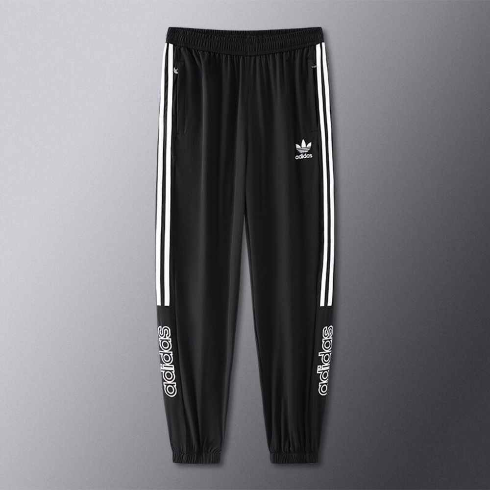 Adidas Black Joggers with White Accents